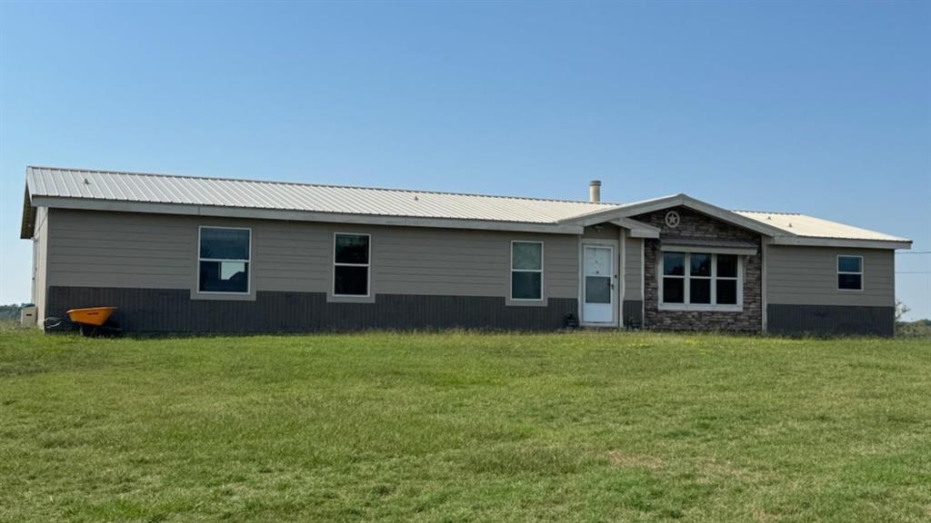 768 County Road 2220 Talco, TX 75487 - Photo 8 of 40 a view of a house with a yard
