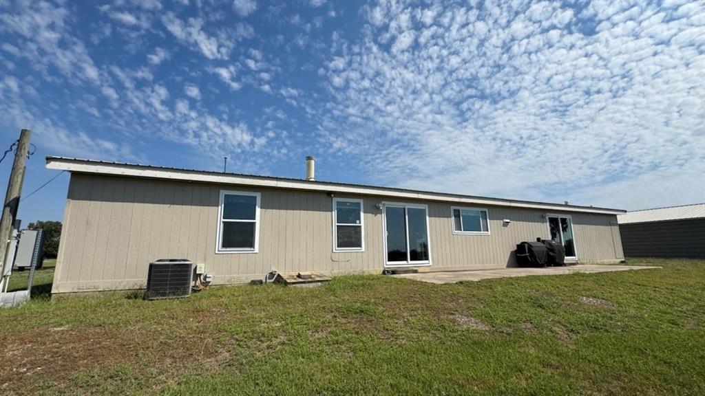 768 County Road 2220 Talco, TX 75487 - Photo 10 of 40 a view of a house with backyard