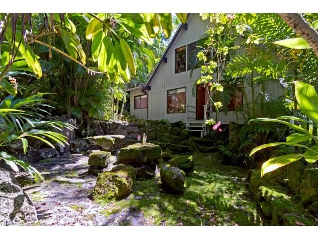 a backyard of a house with lots of green space