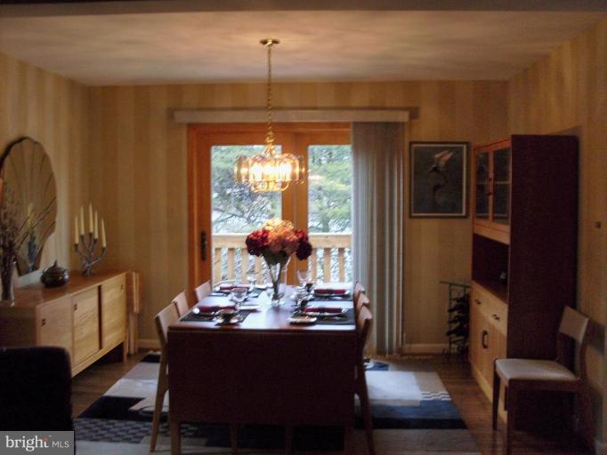 11082 Thrush Ridge Road Reston, VA 20191 - Photo 3 of 14 a view of a livingroom with furniture and window