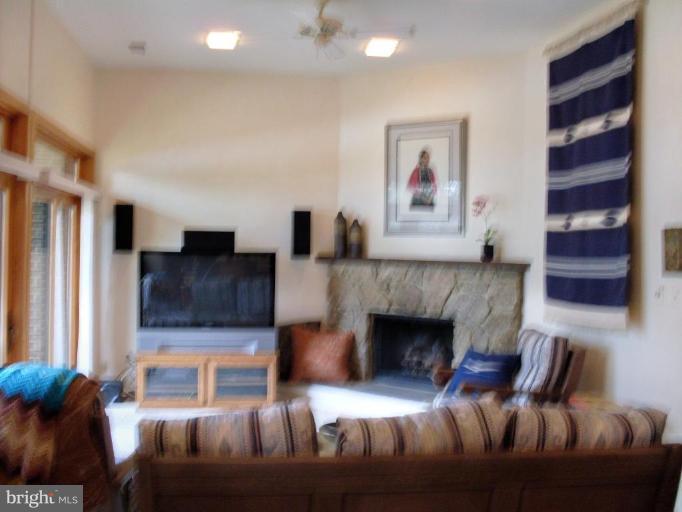 11082 Thrush Ridge Road Reston, VA 20191 - Photo 8 of 14 a living room with furniture and a fireplace