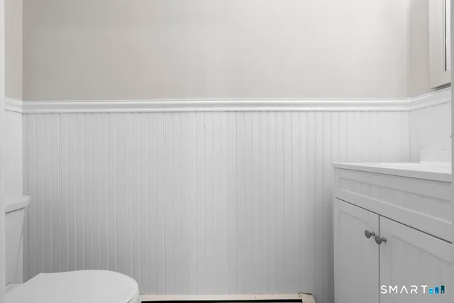 a bathroom with a shower curtain