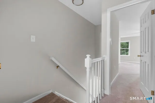 a view of a hallway with entryway