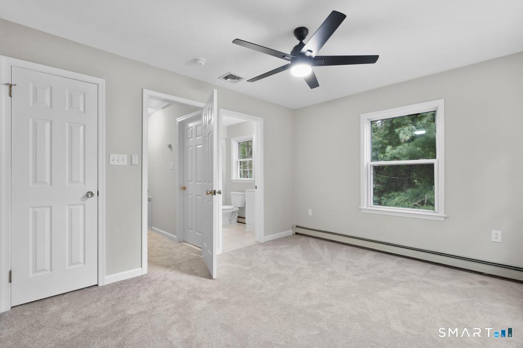 815 South Pine Creek Road Fairfield, CT 06824 - Photo 25 of 32 a view of an empty room with a window