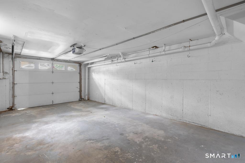 815 South Pine Creek Road Fairfield, CT 06824 - Photo 28 of 32 a view of a garage