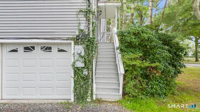 a view of a pathway with a house