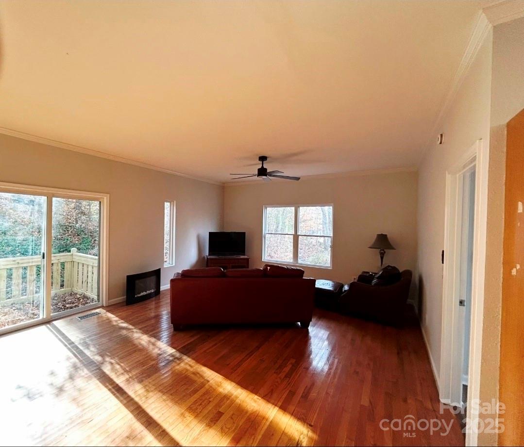 178 Levi Road Columbus, NC 28722 - Photo 22 of 36 a bedroom with a bed window and a couch