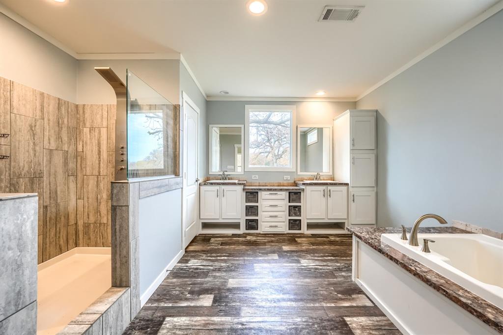 575 Highway 276 Point, TX 75472 - Photo 15 of 32 a large white kitchen with a large window