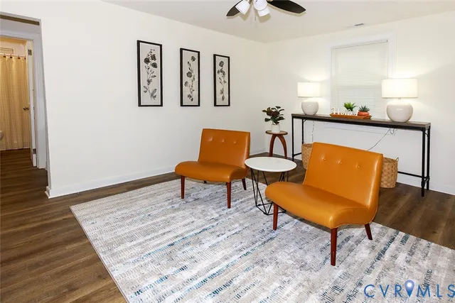 a kitchen that has a table and chairs in it