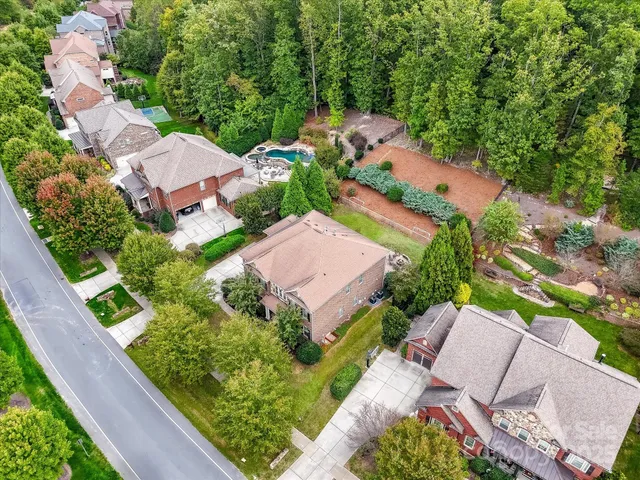 an aerial view of a house with a garden