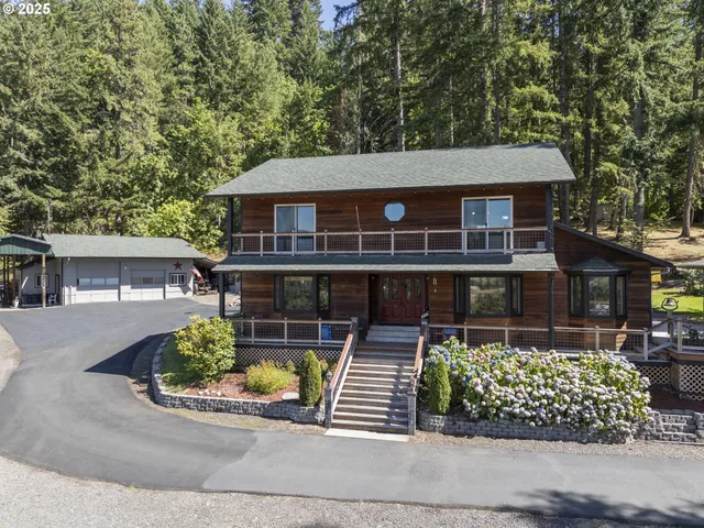 front view of a house with a bench