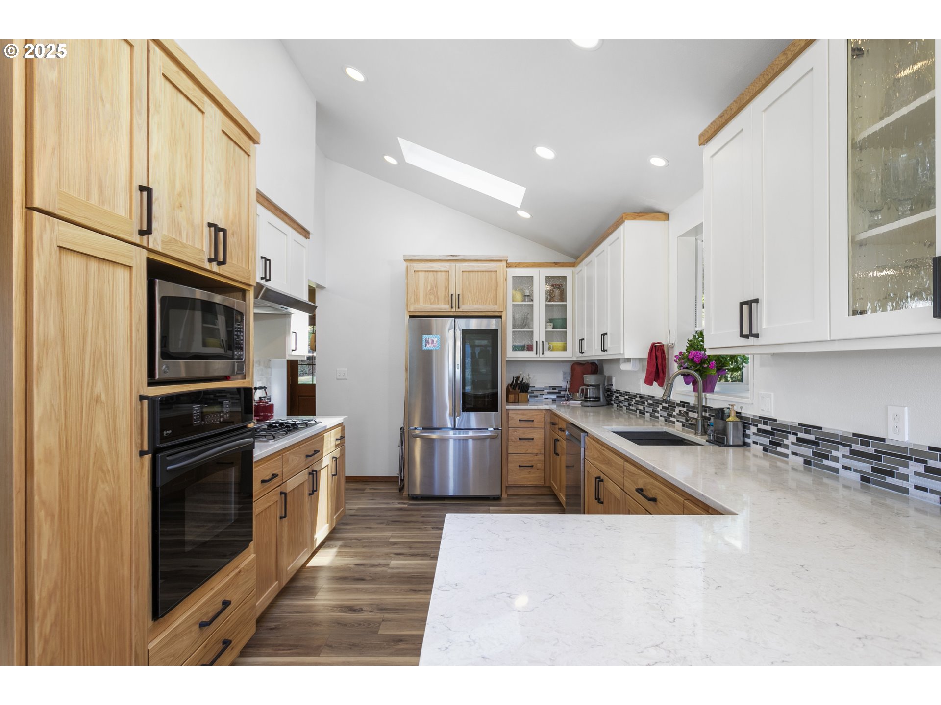 36589 Alder Branch Road Springfield, OR 97478 - Photo 19 of 36 a kitchen with granite countertop a stove sink and refrigerator