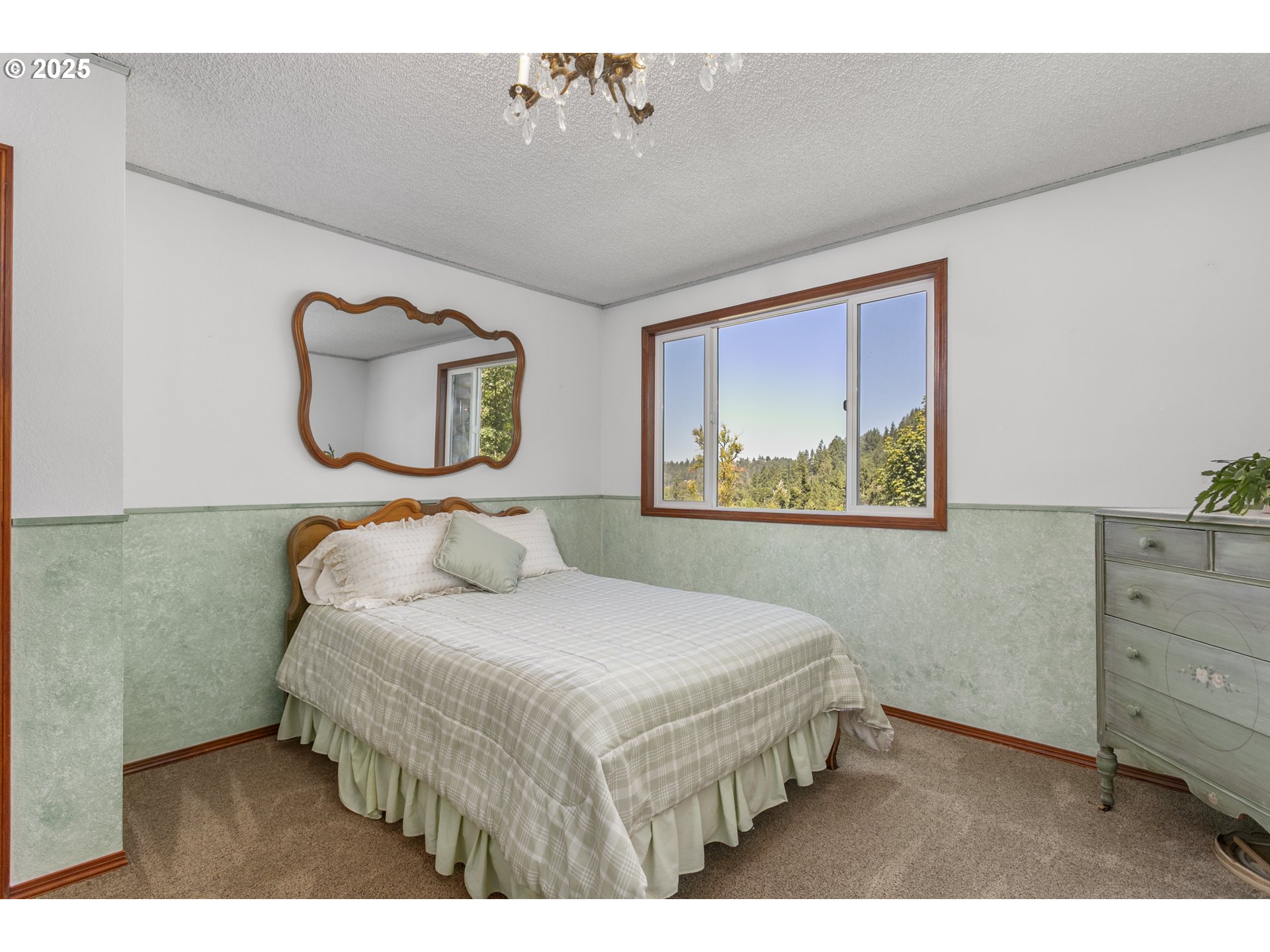 36589 Alder Branch Road Springfield, OR 97478 - Photo 24 of 36 a bedroom with a bed and a painting on the wall