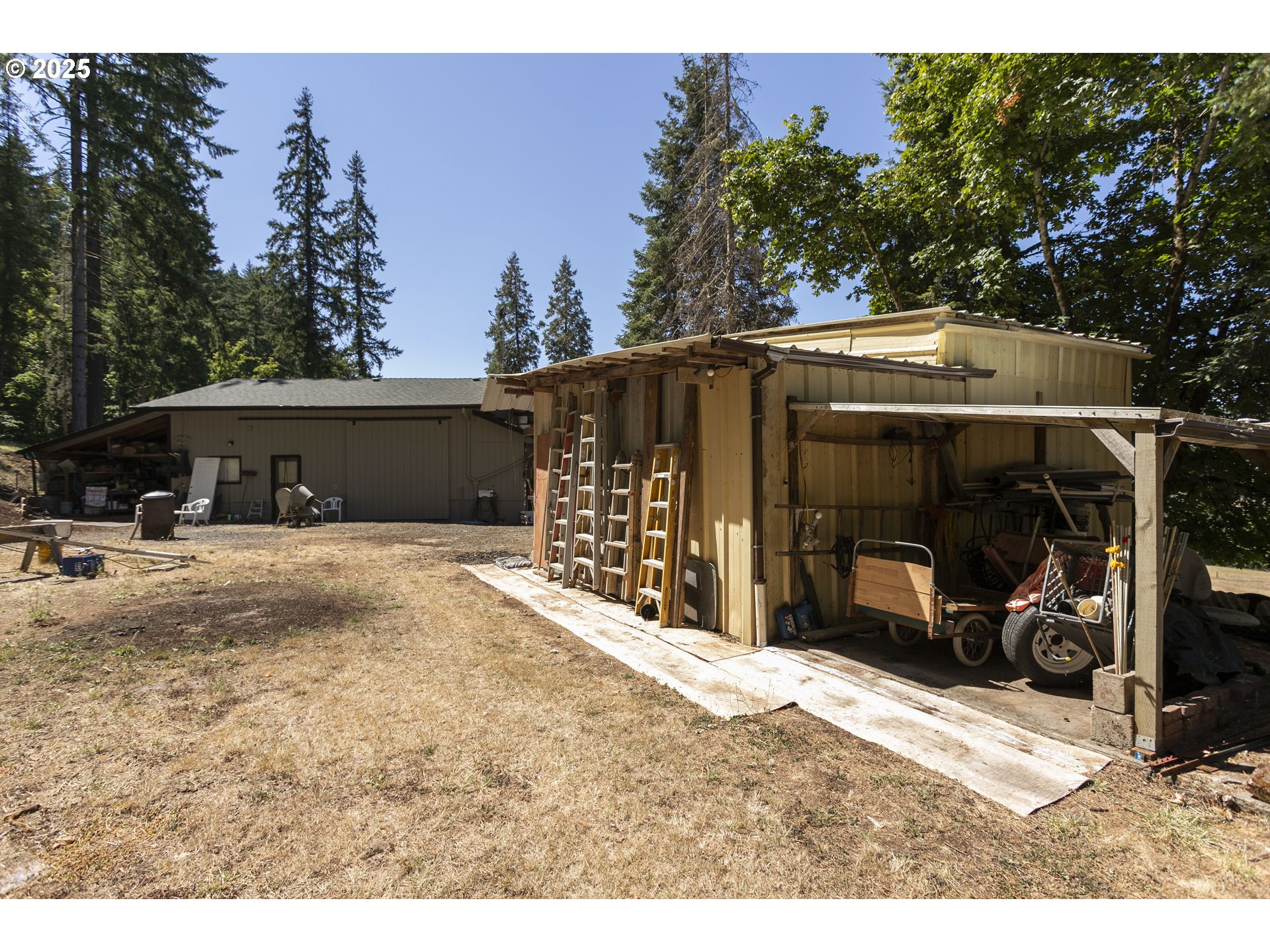 36589 Alder Branch Road Springfield, OR 97478 - Photo 35 of 36 a view of a house with backyard and sitting area