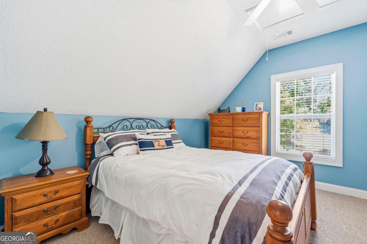 172 Mays Road Milledgeville, GA 31061 - Photo 33 of 54 a bedroom with a bed and a window