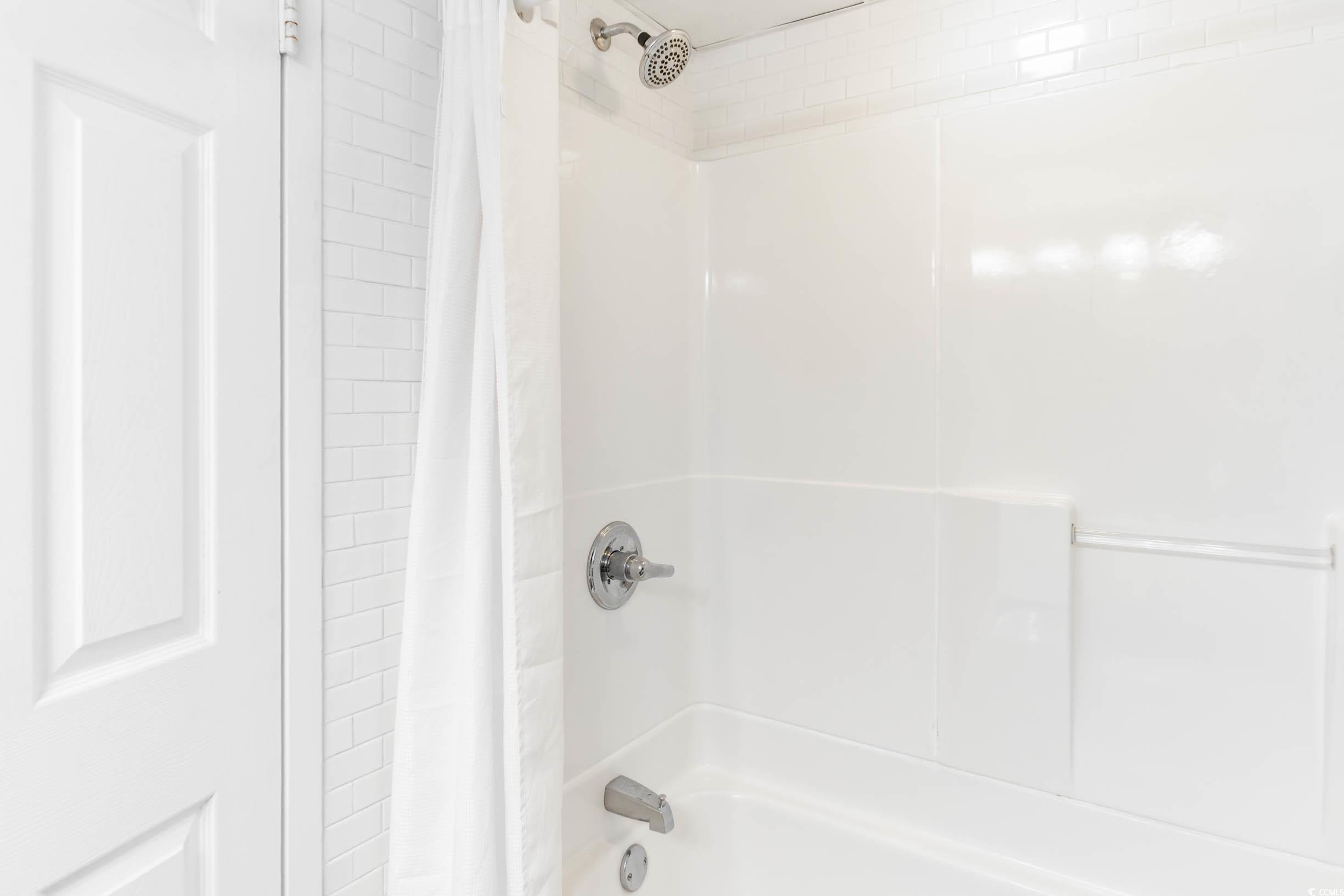 201 74th Avenue North, Unit 2532 Myrtle Beach, SC 29572 - Photo 18 of 39 Bathroom featuring shower / bath combo with shower