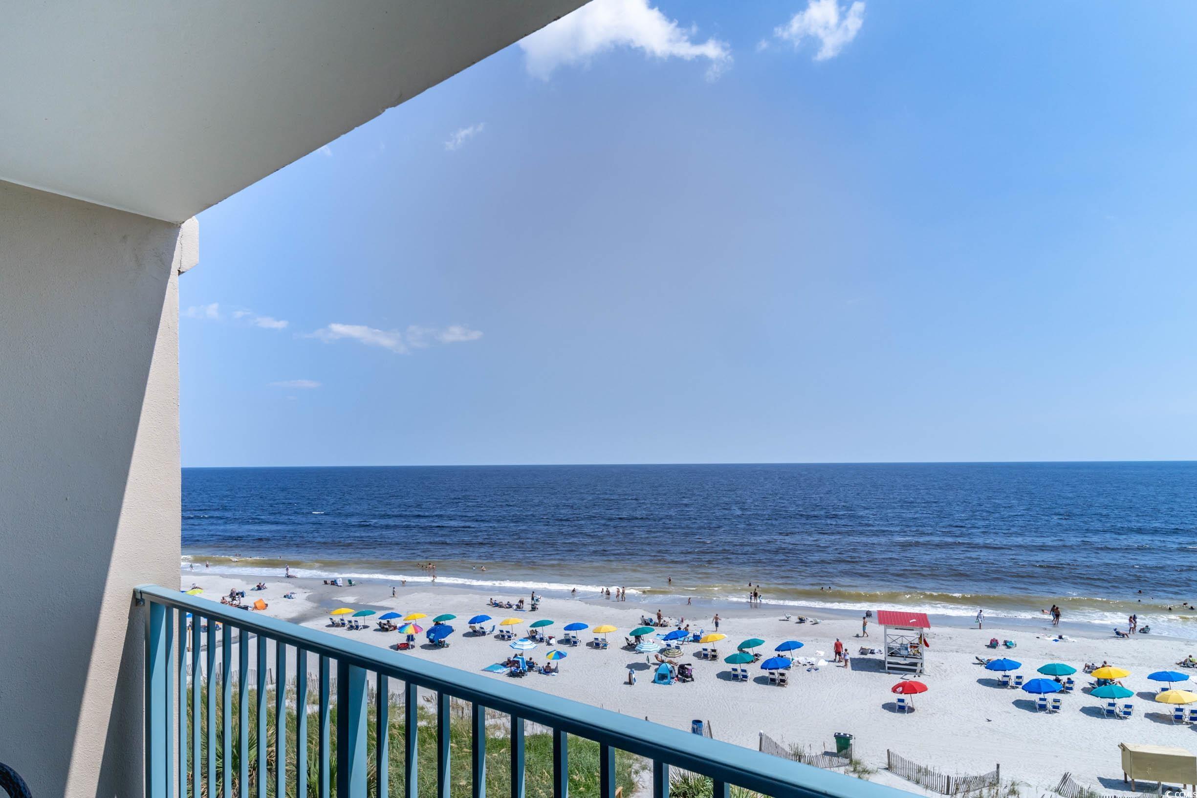 201 74th Avenue North, Unit 2532 Myrtle Beach, SC 29572 - Photo 19 of 39 Balcony featuring a view of the beach and a water