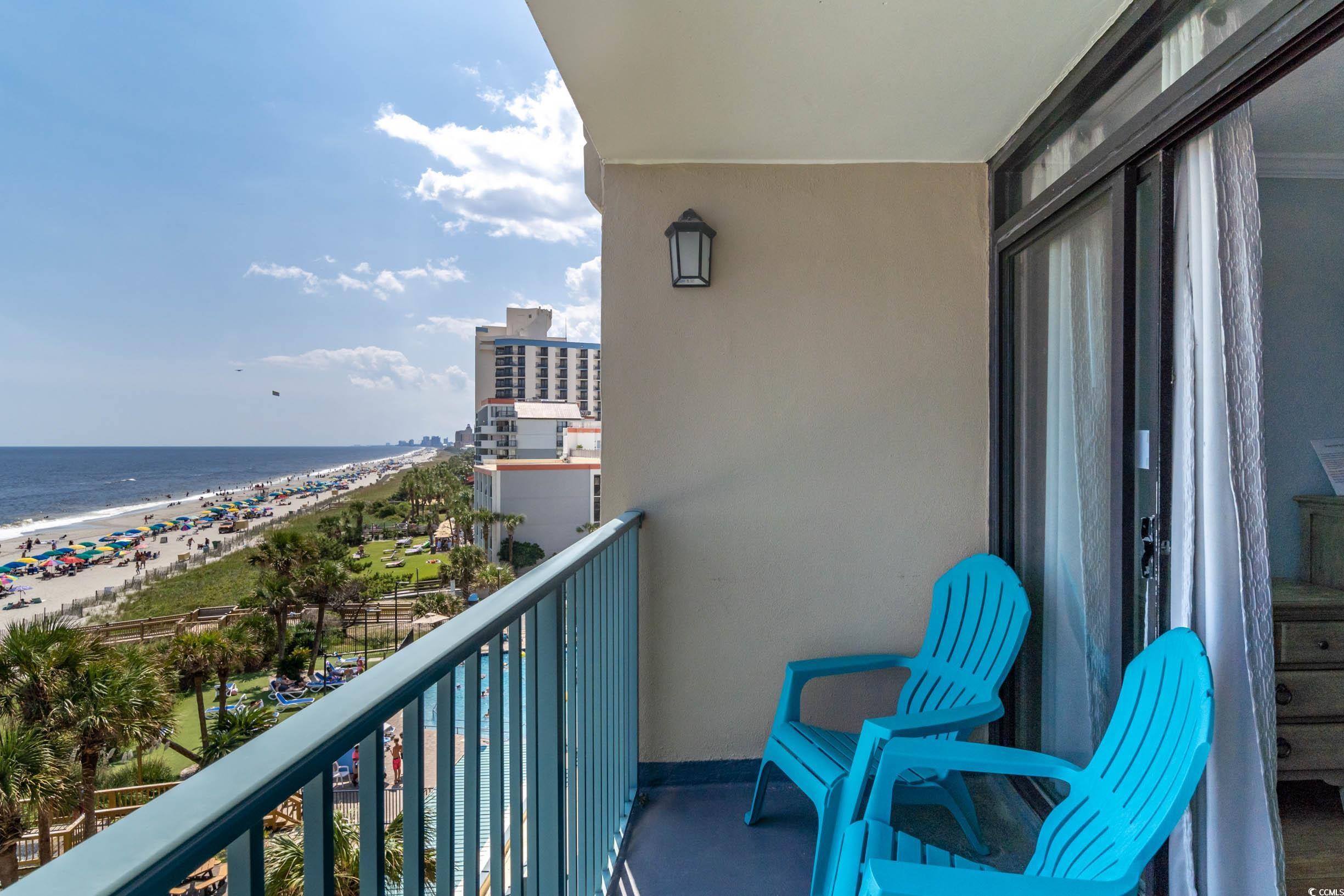 201 74th Avenue North, Unit 2532 Myrtle Beach, SC 29572 - Photo 21 of 39 Balcony featuring a view of the beach and a water