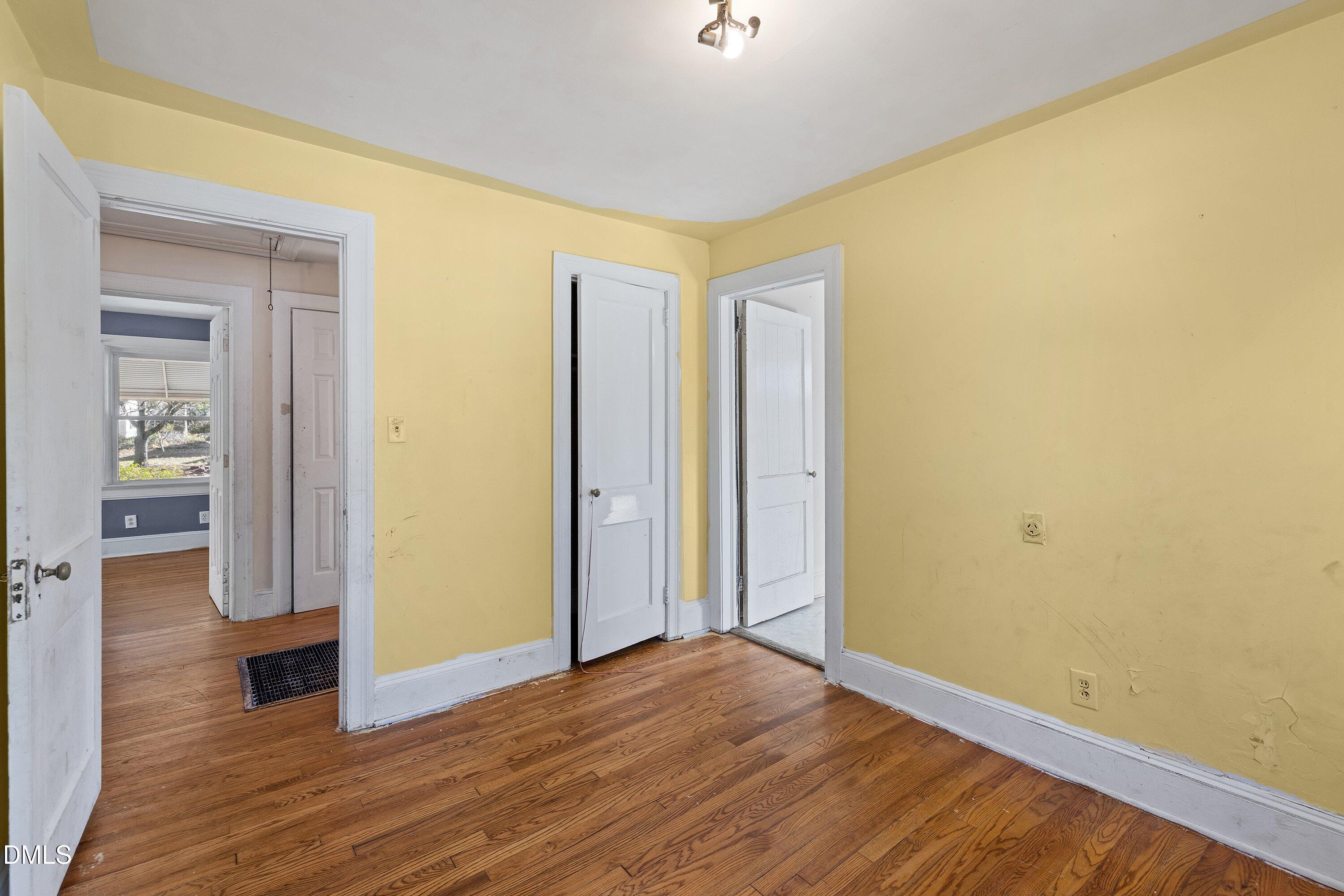 1205 Watauga Street Raleigh, NC 27604 - Photo 13 of 26 a view of hallway with wooden floor