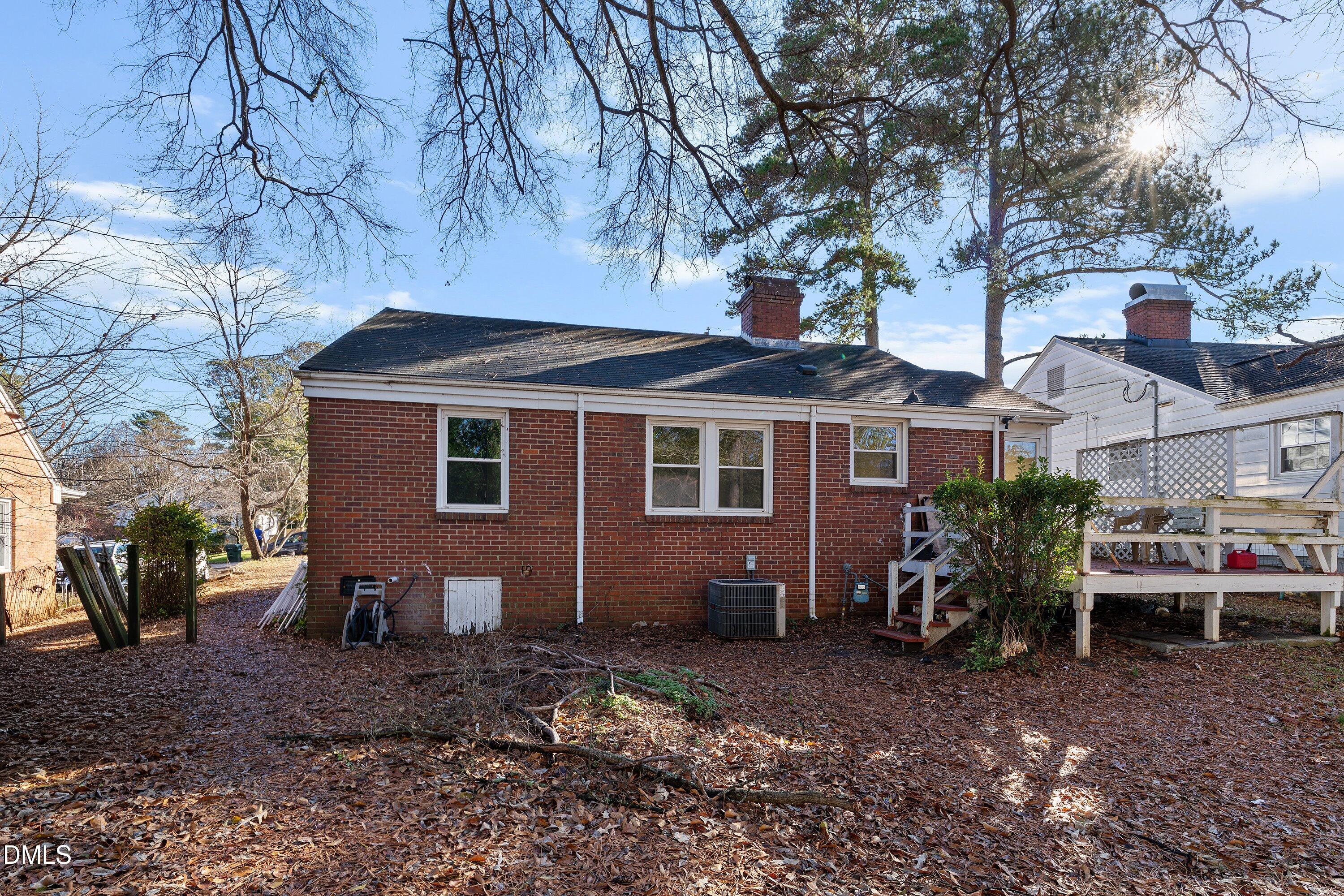 1205 Watauga Street Raleigh, NC 27604 - Photo 23 of 26 a front view of a house with garden