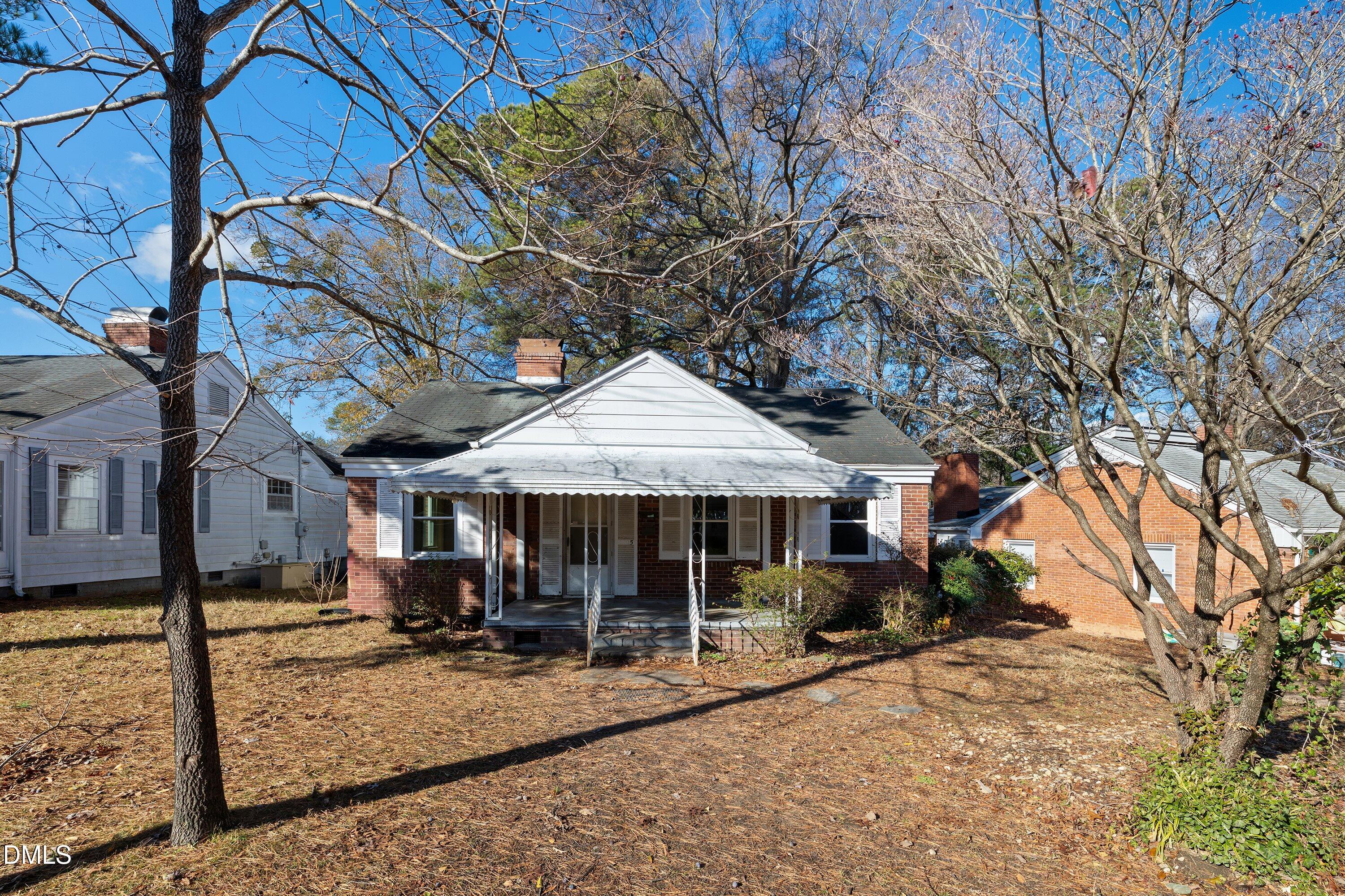 1205 Watauga Street Raleigh, NC 27604 - Photo 25 of 26 a front view of a house with garden