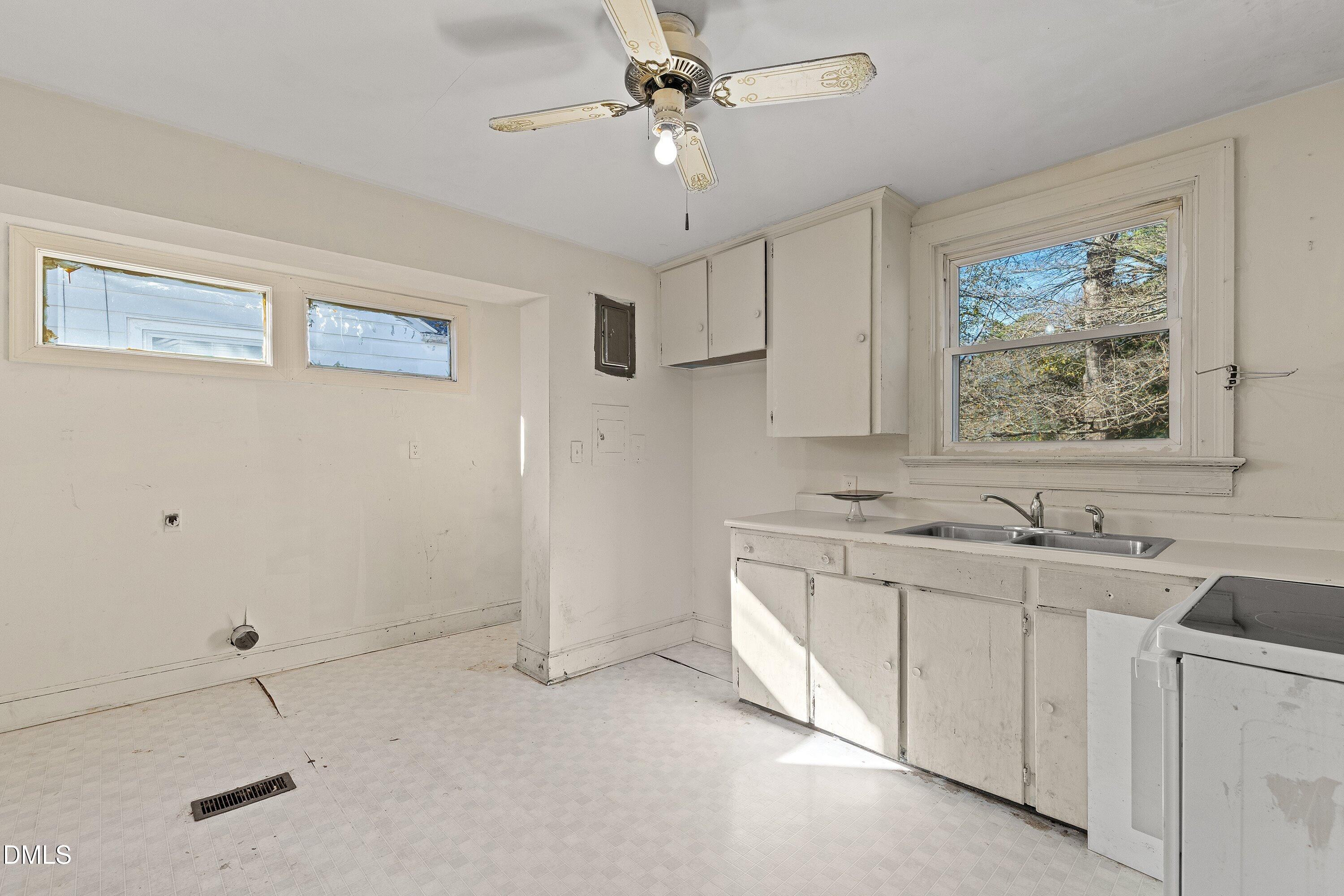 1205 Watauga Street Raleigh, NC 27604 - Photo 9 of 26 a view of a kitchen with electric appliances