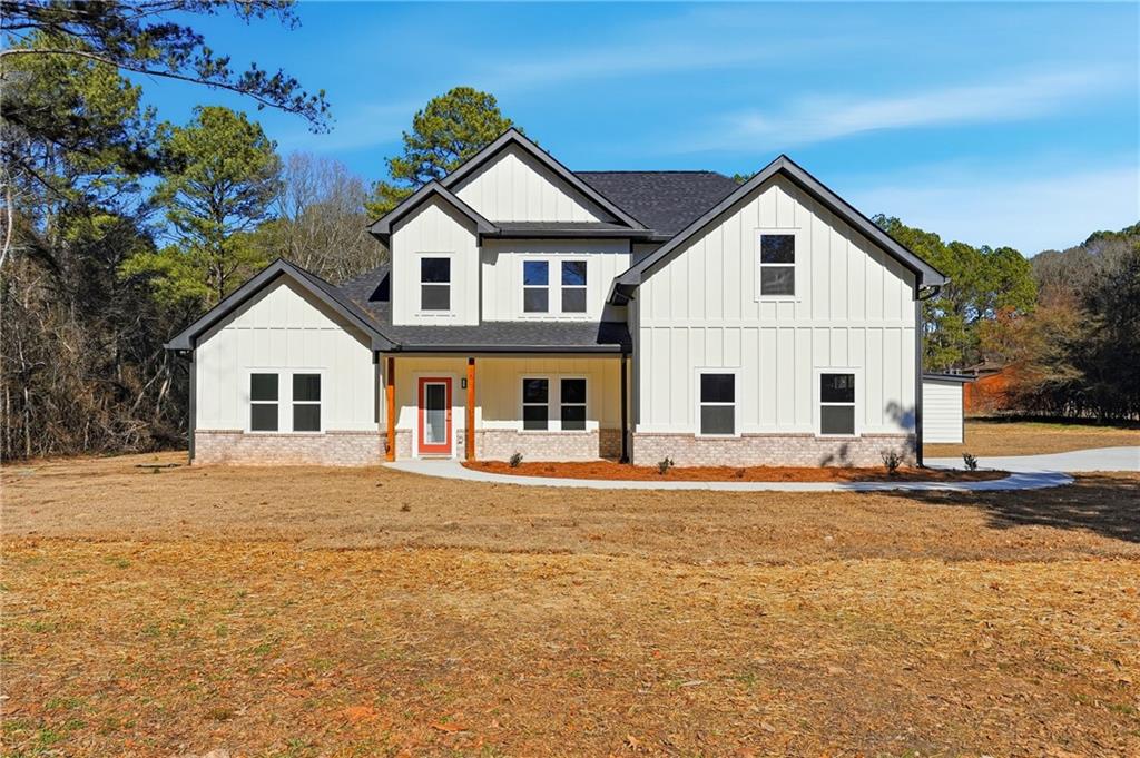 644 Hampton Road Hampton, GA 30228 - Photo 2 of 40 a view of a yard in front of a house with a yard