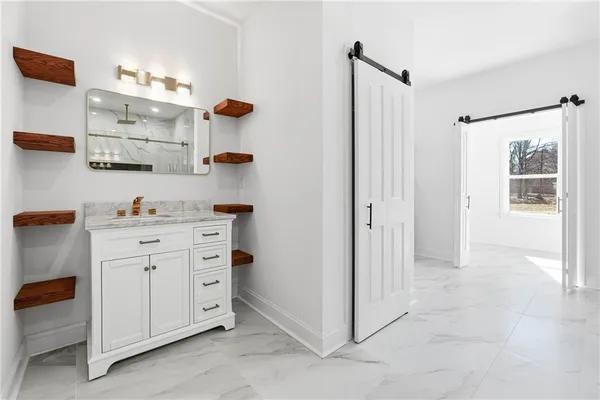 a room with cabinets and a window