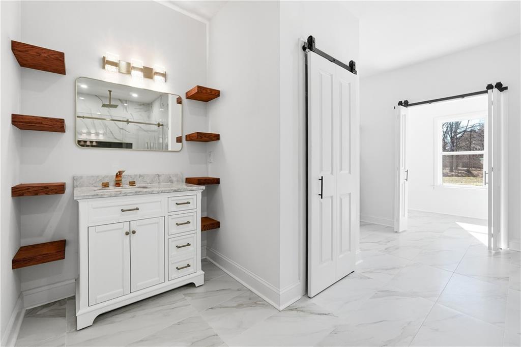 644 Hampton Road Hampton, GA 30228 - Photo 24 of 40 a room with cabinets and a window