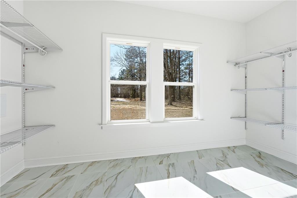 644 Hampton Road Hampton, GA 30228 - Photo 28 of 40 a bathroom with a sink and a toilet