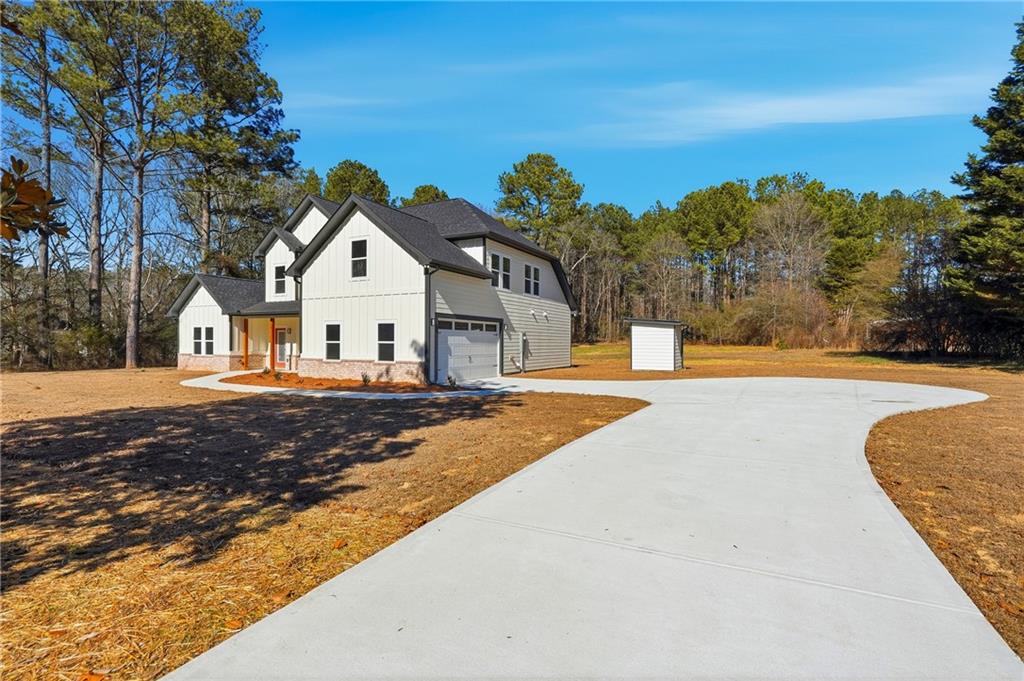644 Hampton Road Hampton, GA 30228 - Photo 5 of 40 a view of a house with a yard