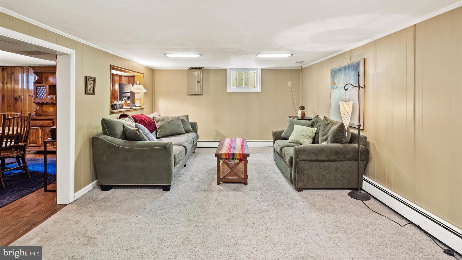 11 Alton Road Hamilton, NJ 08619 - Photo 22 of 31 a living room with furniture and a window