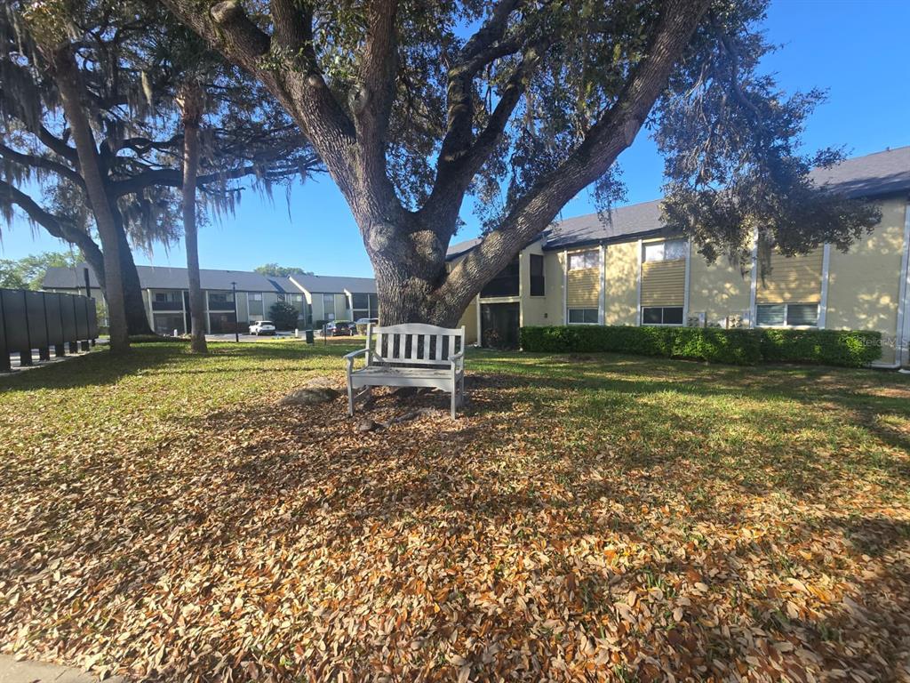 902 Lake Destiny Road, Unit C Altamonte Springs, FL 32714 - Photo 17 of 23 a view of a park with large trees