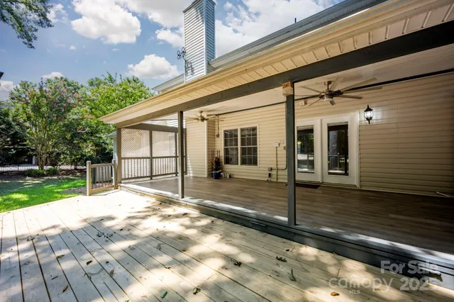 a view of a house with a big yard