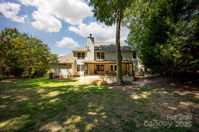 a view of outdoor space with trees all around