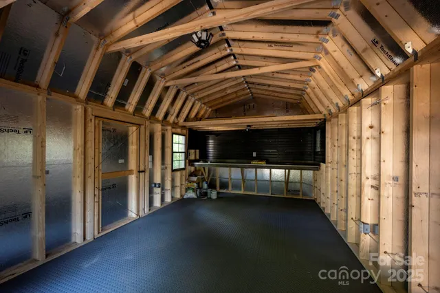 an aerial view of residential house with outdoor space