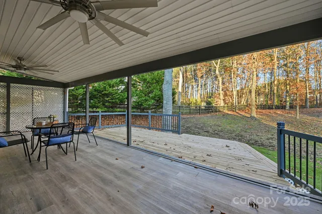 a patio with table and chairs