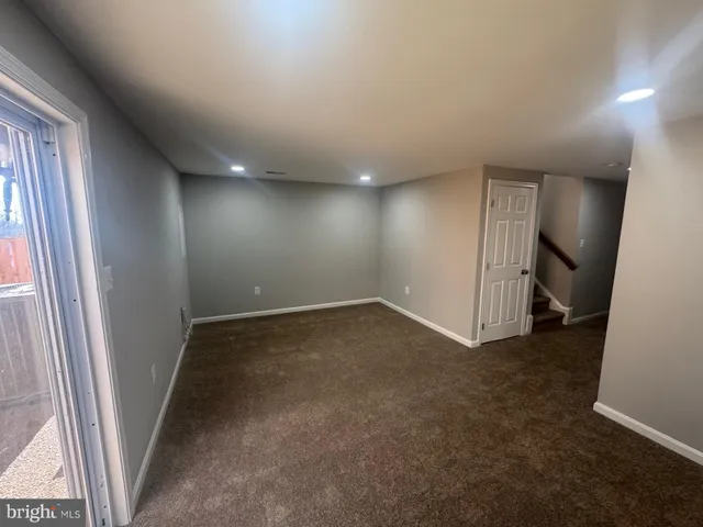 an empty room with a natural light
