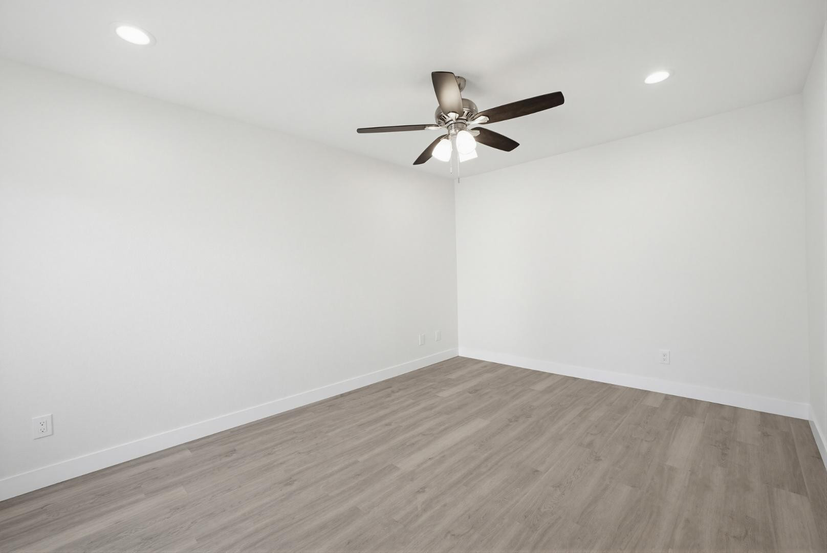 316 East Turquoise Avenue Phoenix, AZ 85020 - Photo 16 of 27 wooden floor in an empty room