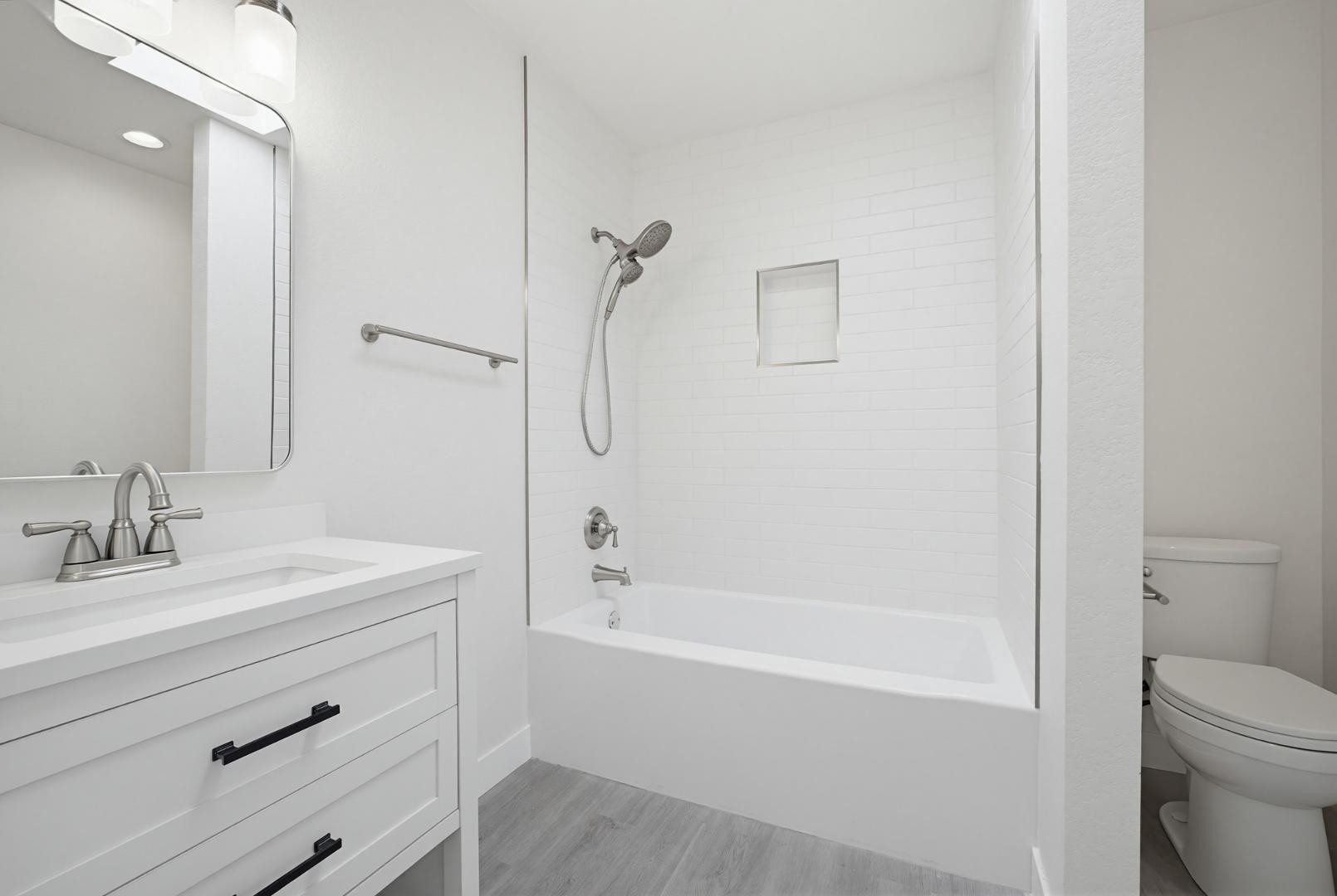 316 East Turquoise Avenue Phoenix, AZ 85020 - Photo 22 of 27 a bathroom with a sink a toilet and shower