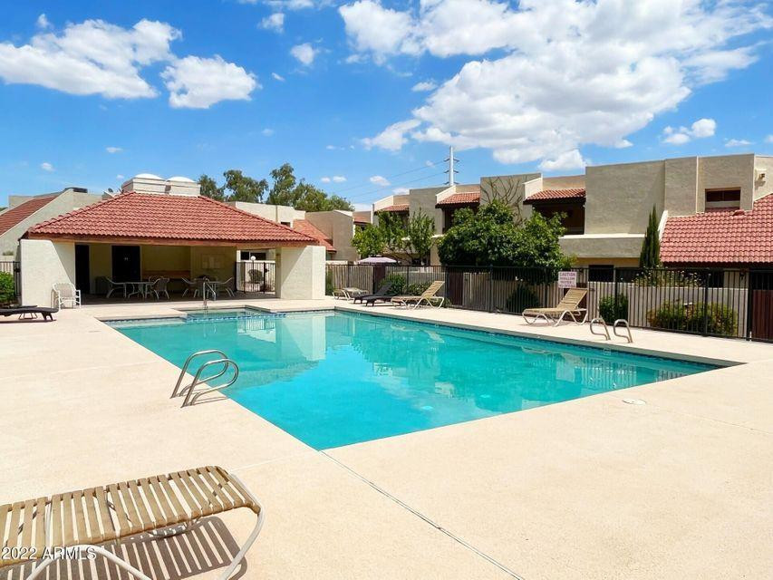 316 East Turquoise Avenue Phoenix, AZ 85020 - Photo 24 of 27 a view of a house with swimming pool and sitting area
