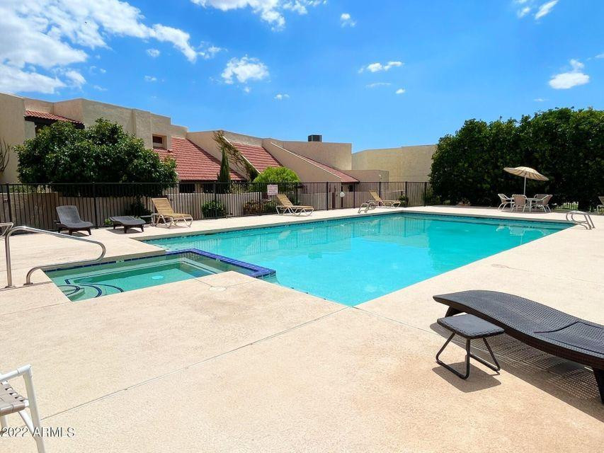 316 East Turquoise Avenue Phoenix, AZ 85020 - Photo 26 of 27 a view of a swimming pool and lounge chairs