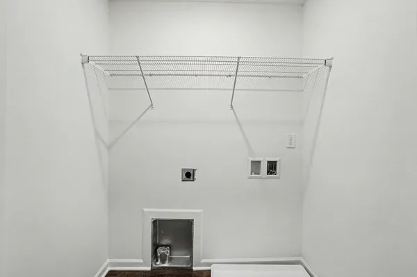 a view of a room with racks on the wall