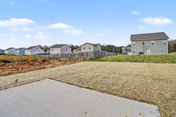 a view of swimming pool with a yard