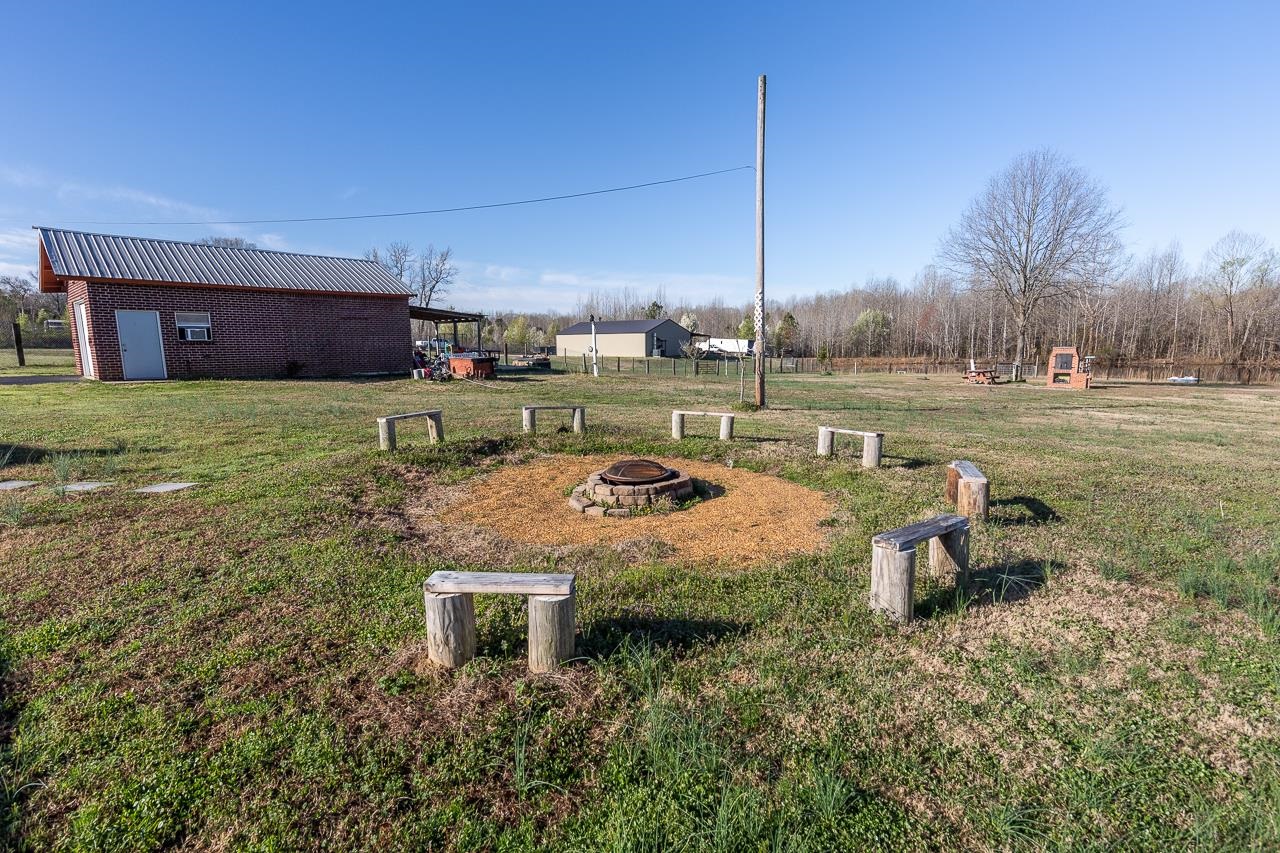 396 Woodview Road Byhalia, MS 38611 - Photo 21 of 23 a view of a house with a yard