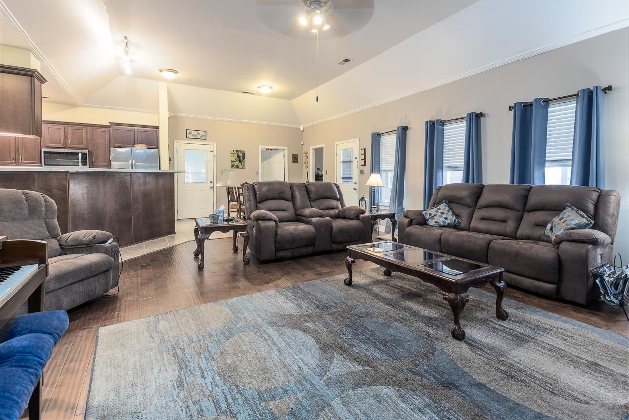 396 Woodview Road Byhalia, MS 38611 - Photo 4 of 23 a living room with furniture and a wooden floor