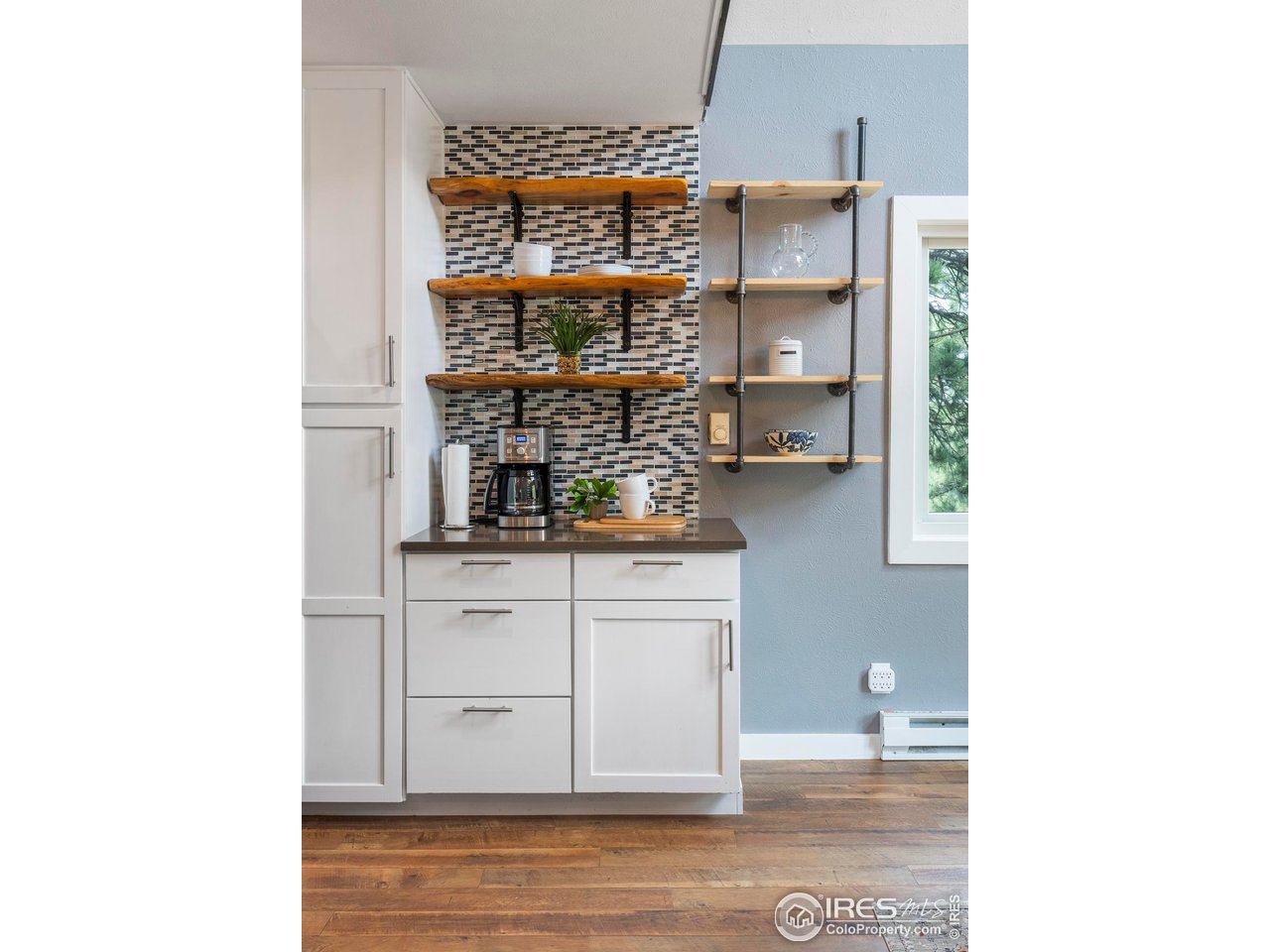 6521 Olde Stage Road Boulder, CO 80302 - Photo 14 of 47 a kitchen with a sink and cabinets