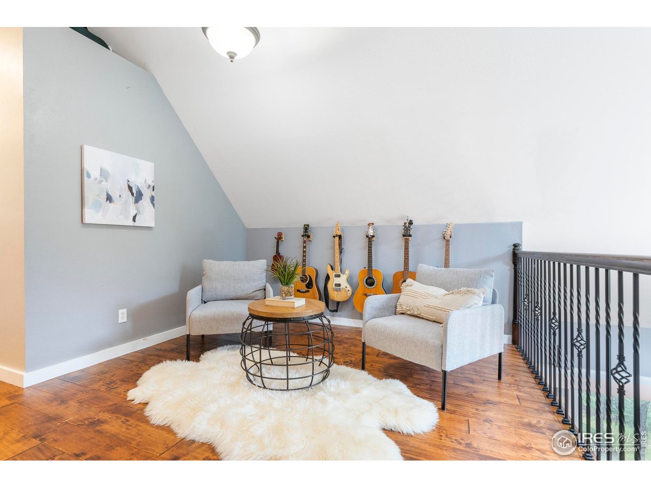 6521 Olde Stage Road Boulder, CO 80302 - Photo 22 of 47 a living room with furniture and a wooden floor