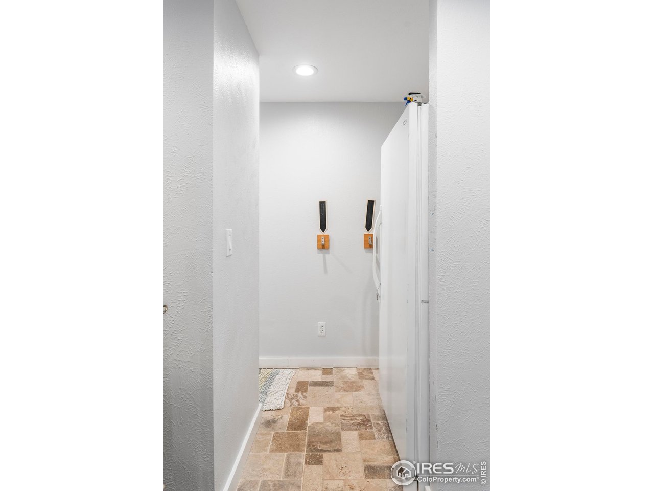 6521 Olde Stage Road Boulder, CO 80302 - Photo 31 of 47 a view of a hallway with wooden floor
