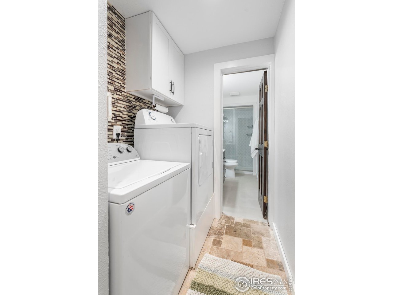 6521 Olde Stage Road Boulder, CO 80302 - Photo 32 of 47 a bathroom with a sink and a mirror
